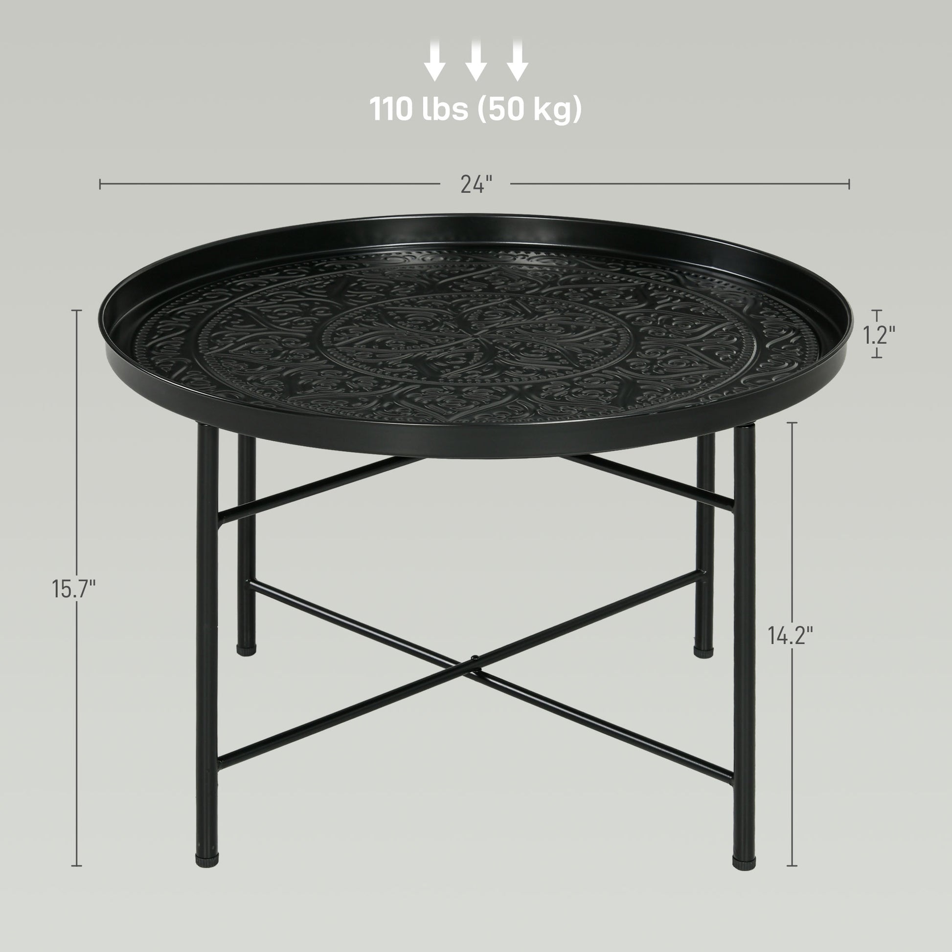 Black metal round accent table with embossed tribal pattern top