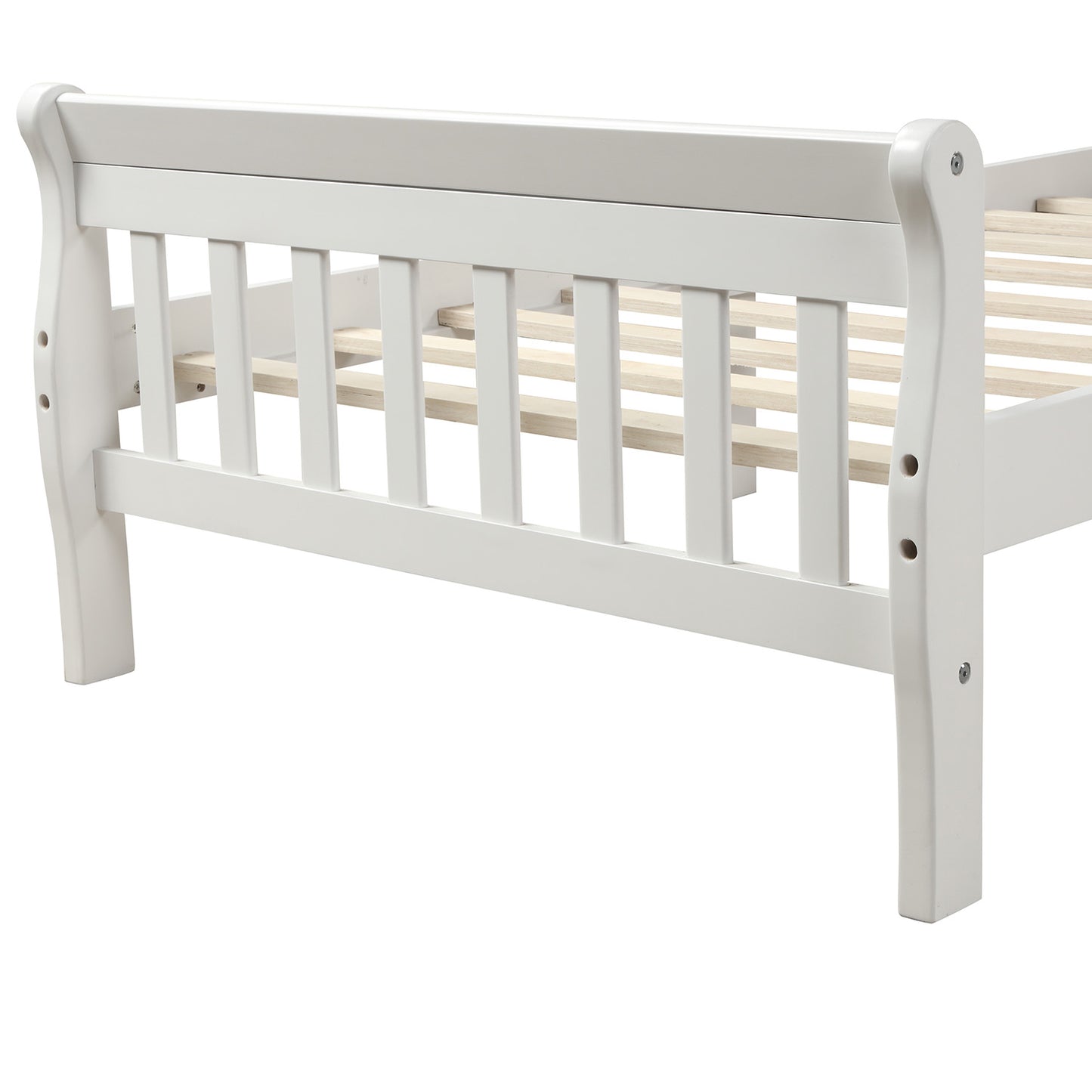 Closeup of white wooden sleigh bed frame with slatted base