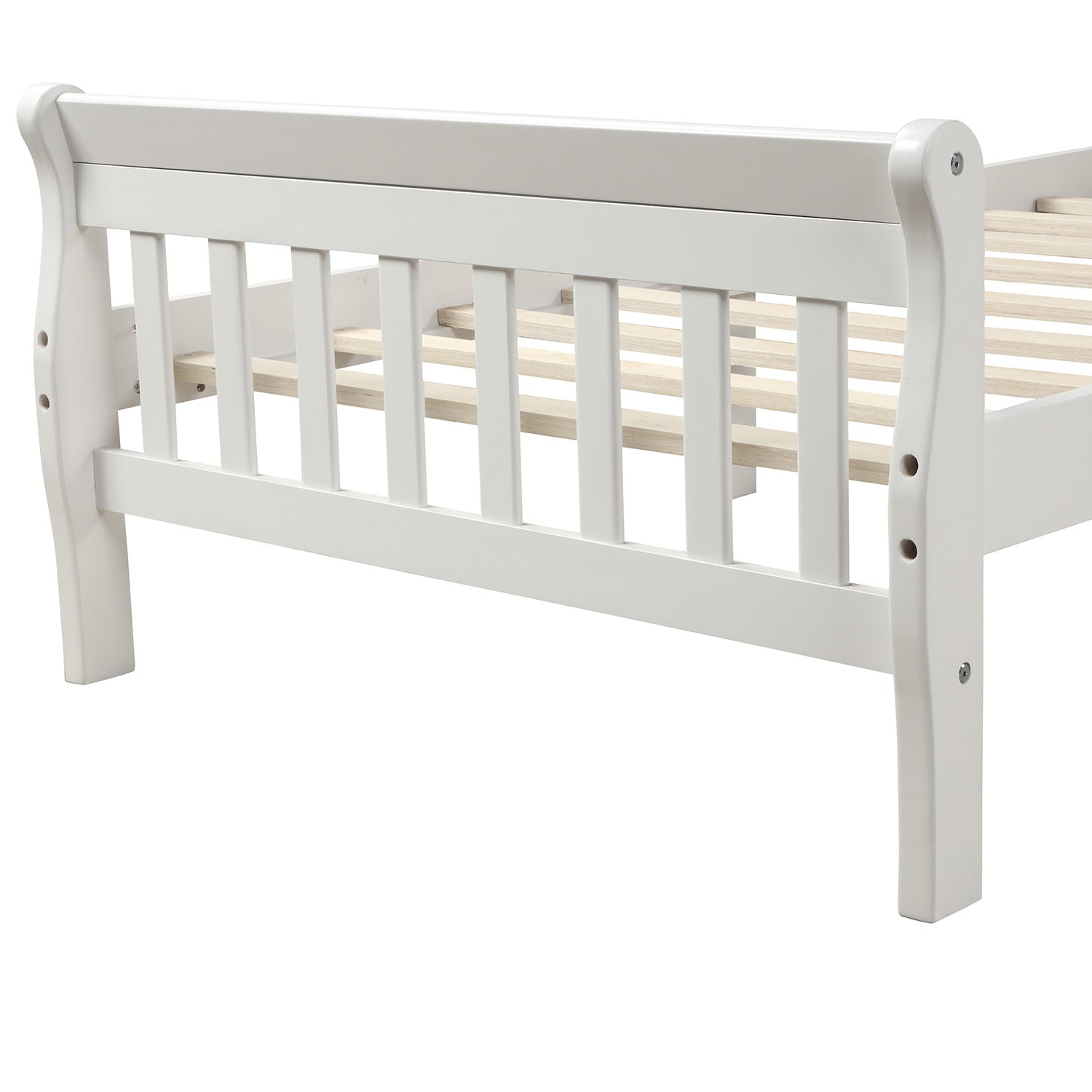Closeup of white wooden sleigh bed frame with slatted base