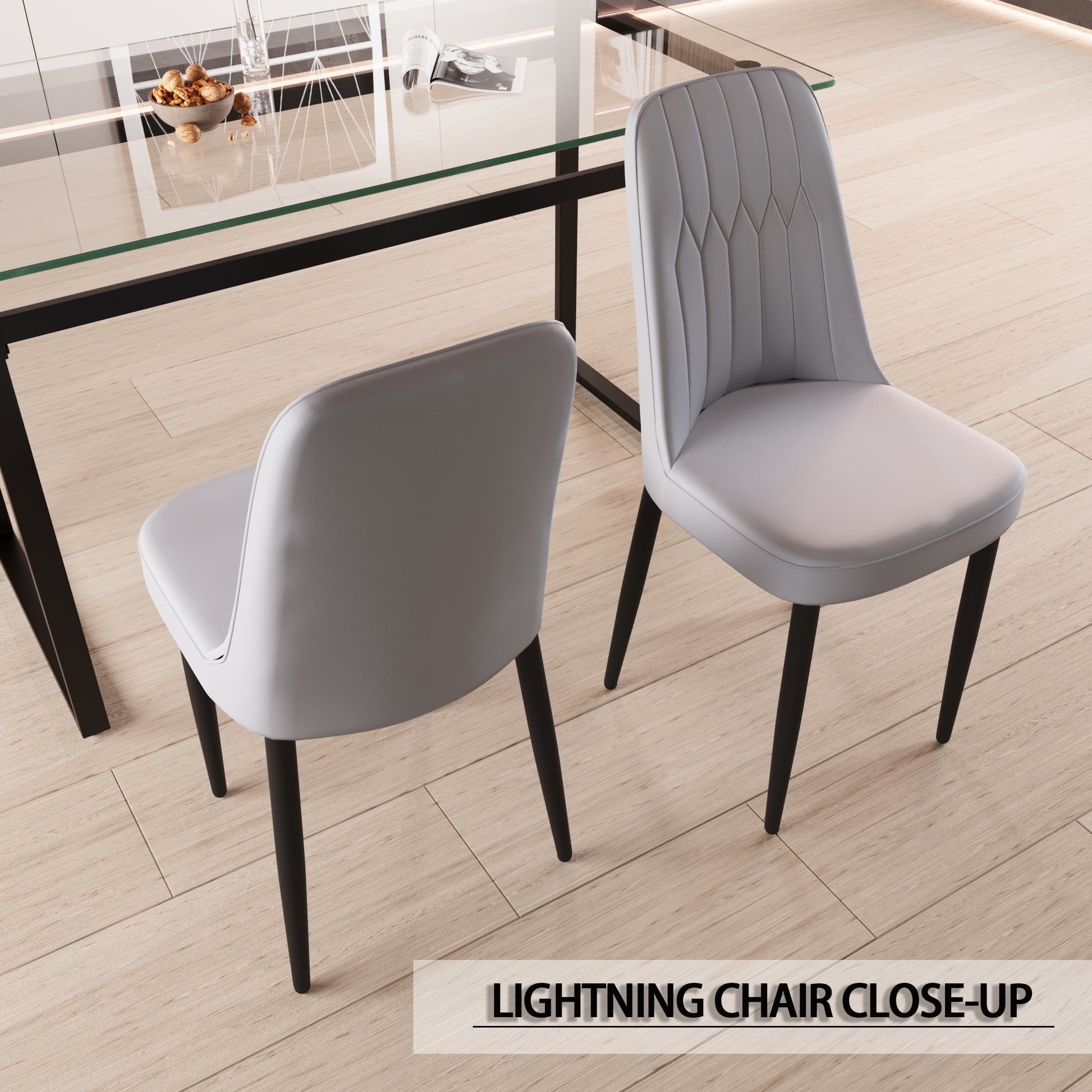 Light grey upholstered dining chair with diamond stitching and black tapered legs