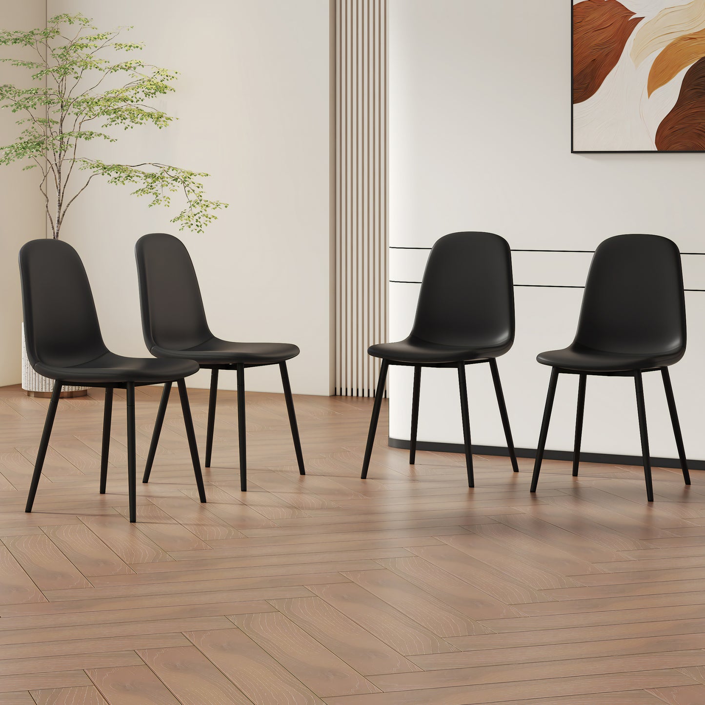 Set of four black modern dining chairs with slim metal legs