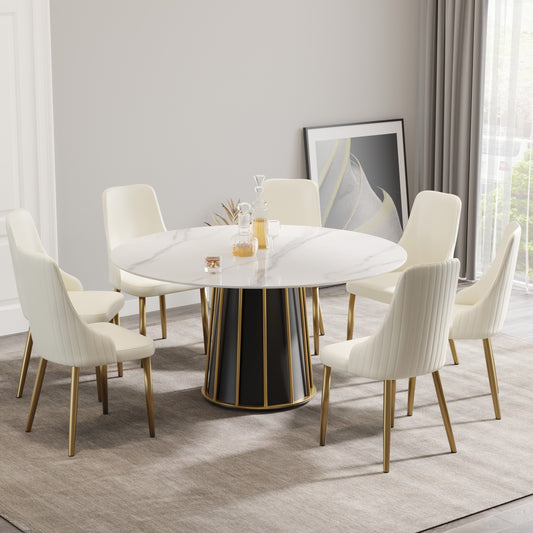 Modern white marble dining table with black and gold base and six cream velvet chairs