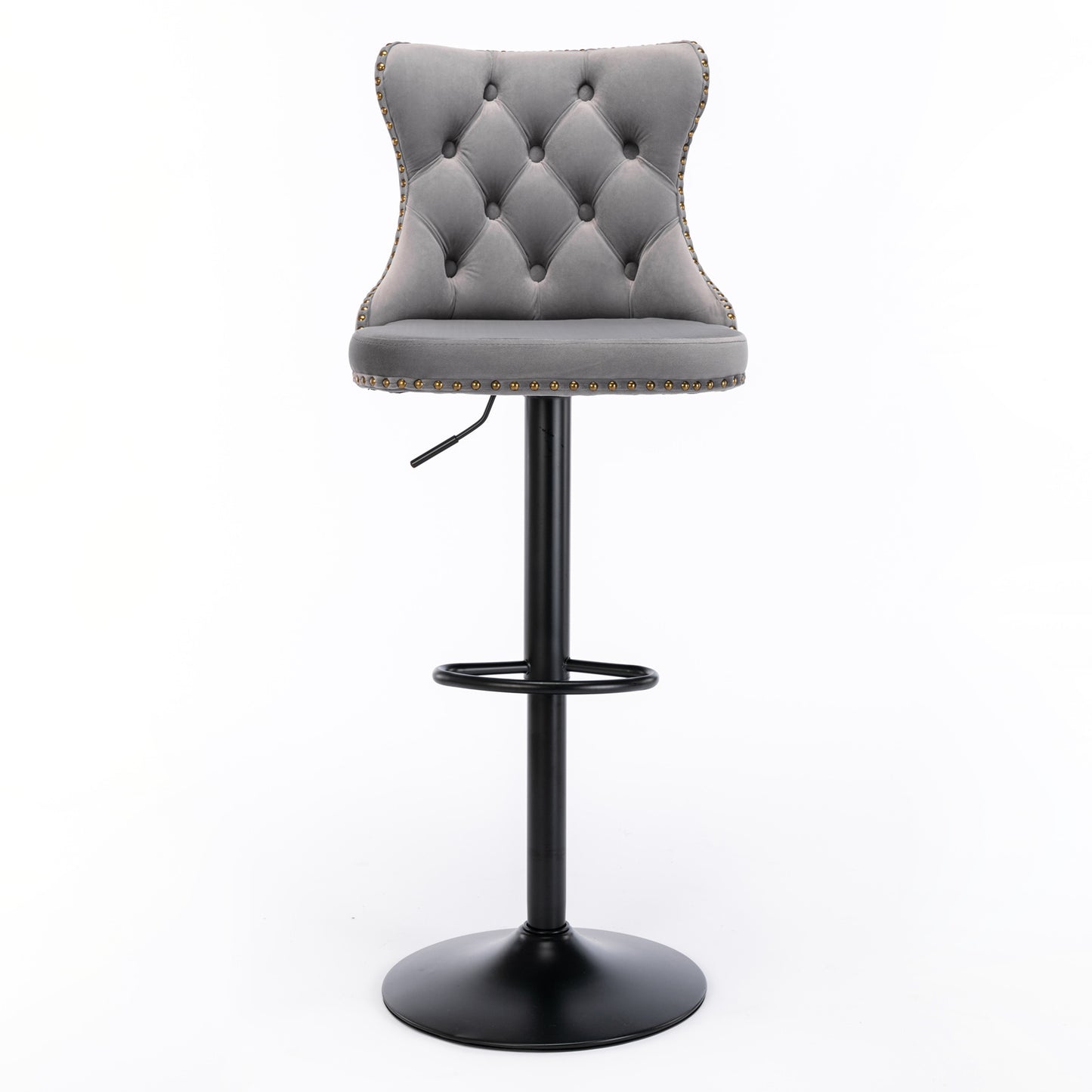 Gray velvet tufted bar stool with gold nailhead trim and adjustable height