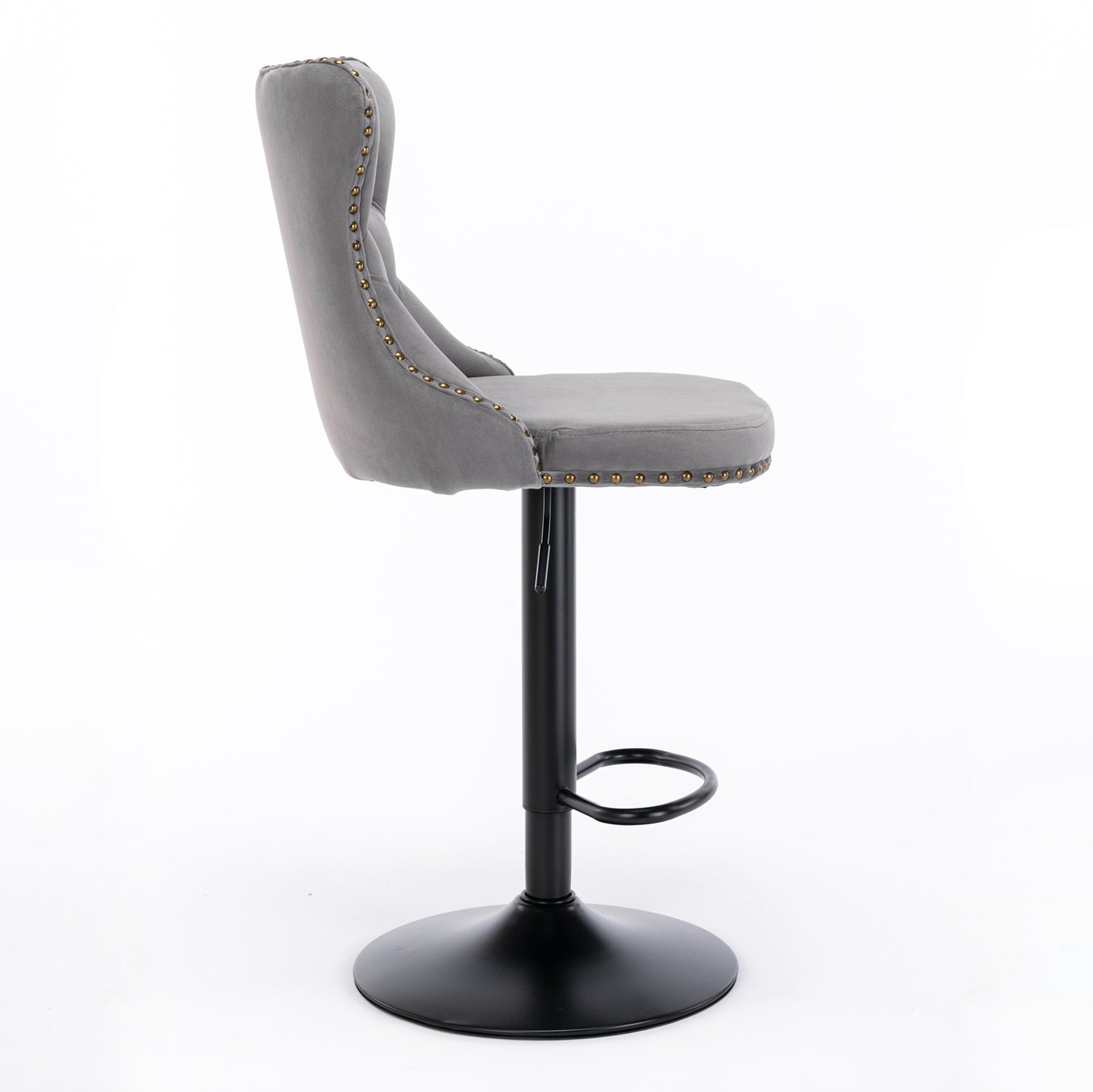 Grey velvet bar stool with gold nailhead trim and adjustable height