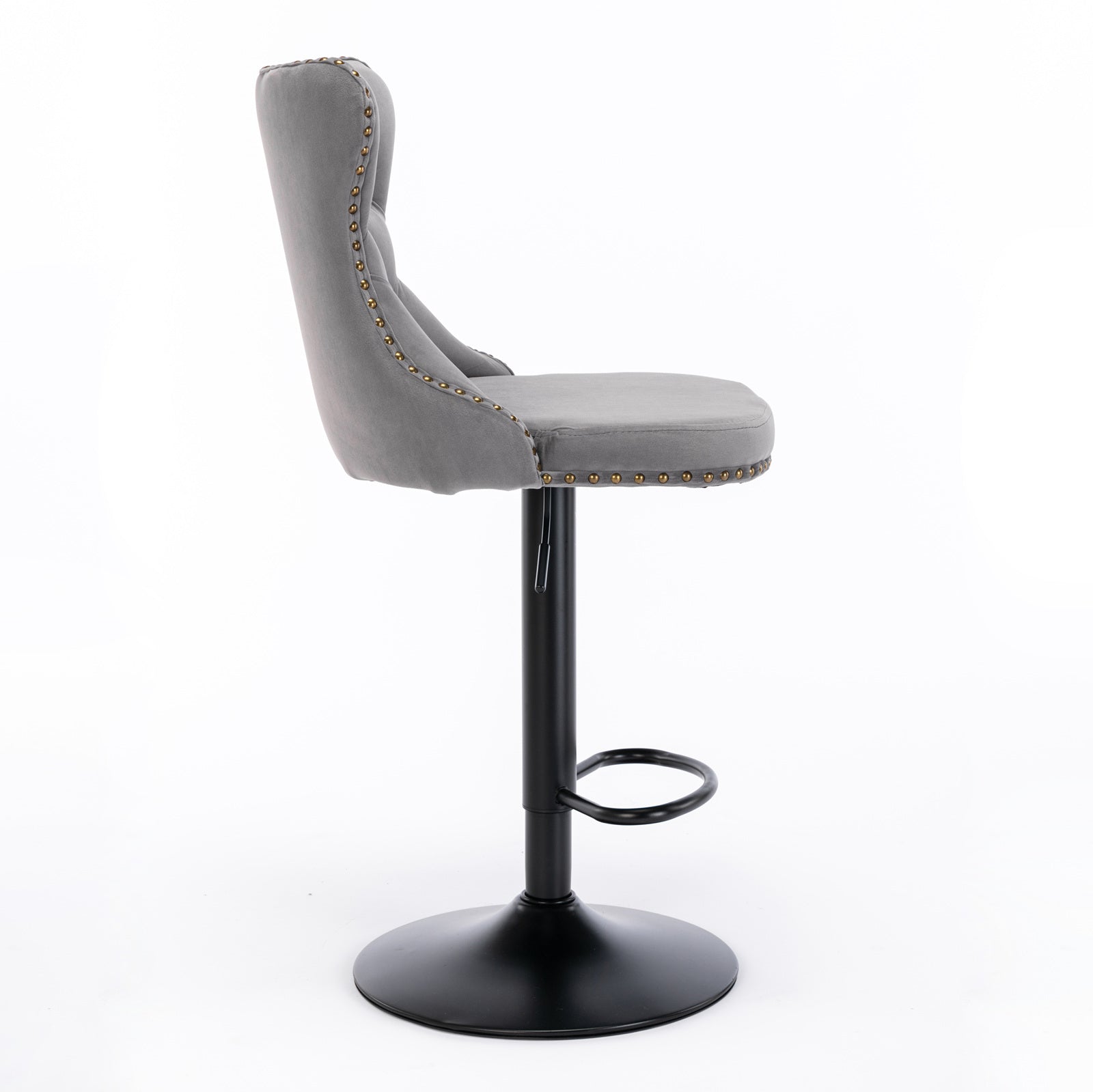 Grey velvet bar stool with gold nailhead trim and adjustable height