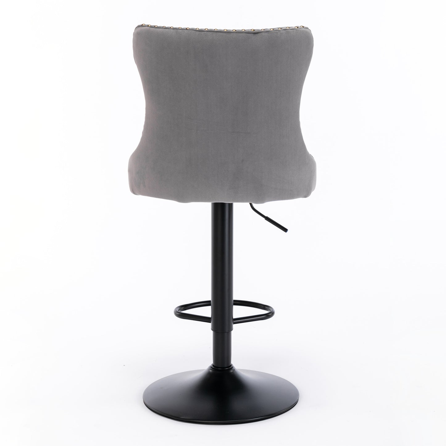 Grey velvet bar stool with diamond tufting and brass nailhead trim