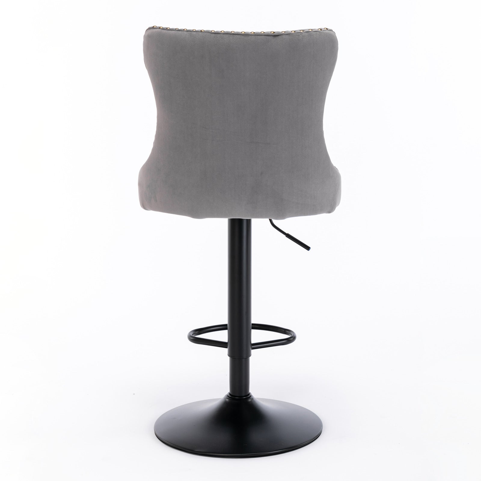 Grey velvet bar stool with diamond tufting and brass nailhead trim