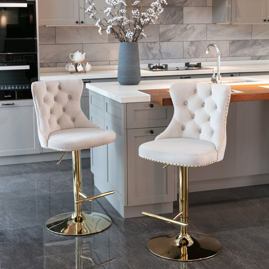 Tufted cream velvet bar stool with gold base and nailhead trim