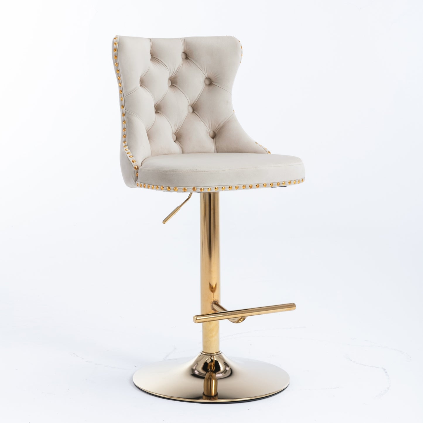 Cream tufted velvet bar stool with gold trim and adjustable gold pedestal base