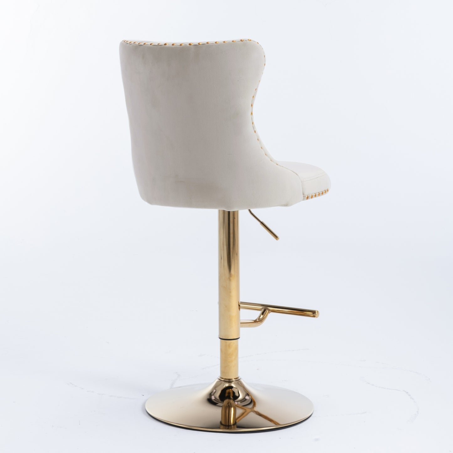 Beige velvet tufted bar stool with gold metal base and adjustable height