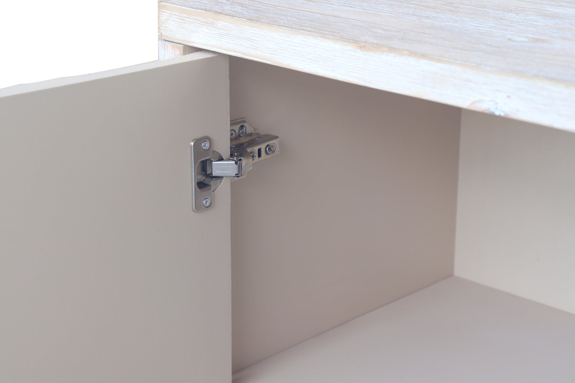 Cream cabinet hinge detail