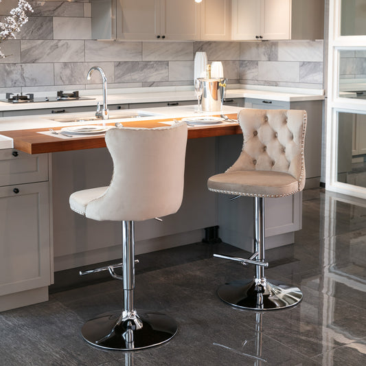 Tufted beige velvet bar stool with chrome base and studded details