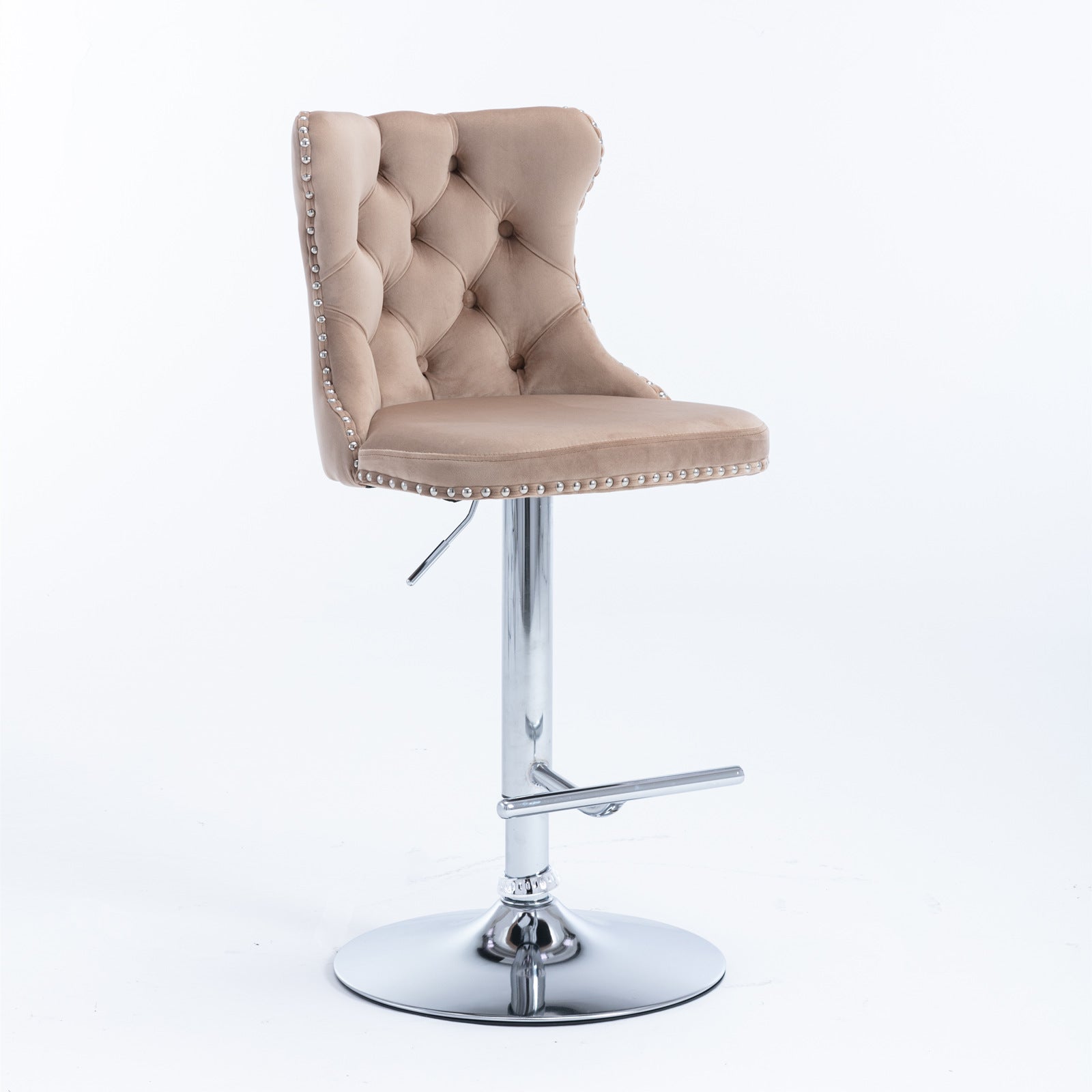 Tufted beige velvet bar stool with silver nailhead trim and adjustable chrome base