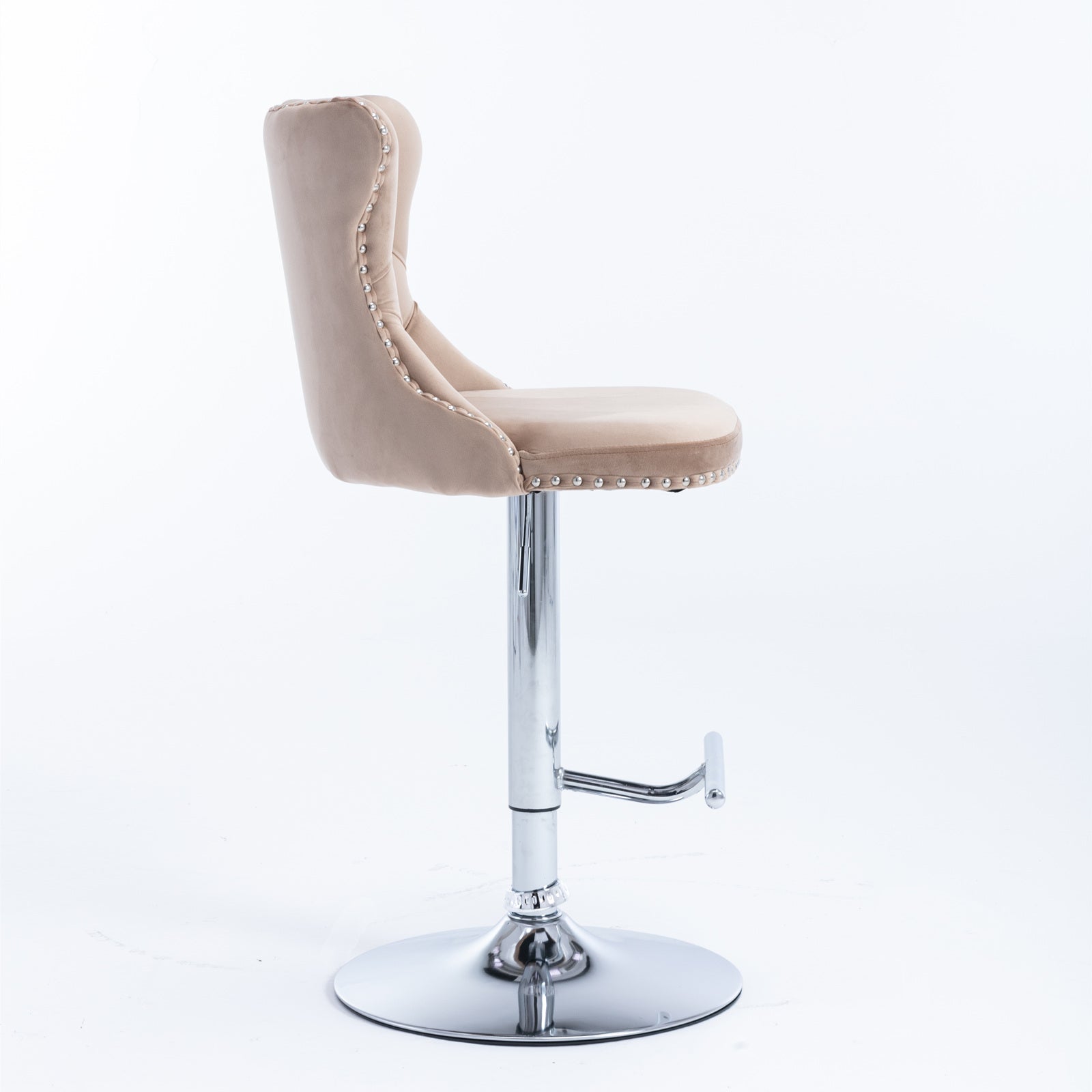 Beige velvet tufted bar stool with polished chrome base and footrest