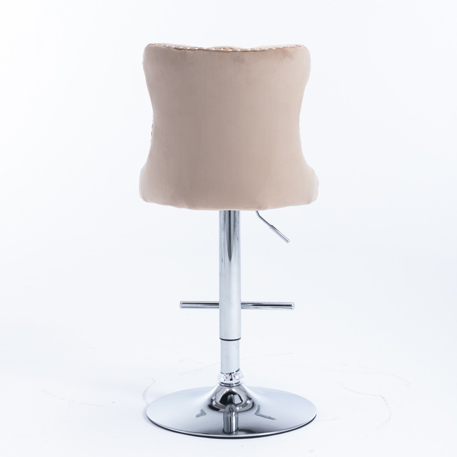 Beige velvet tufted bar stool with silver nailhead trim and chrome base