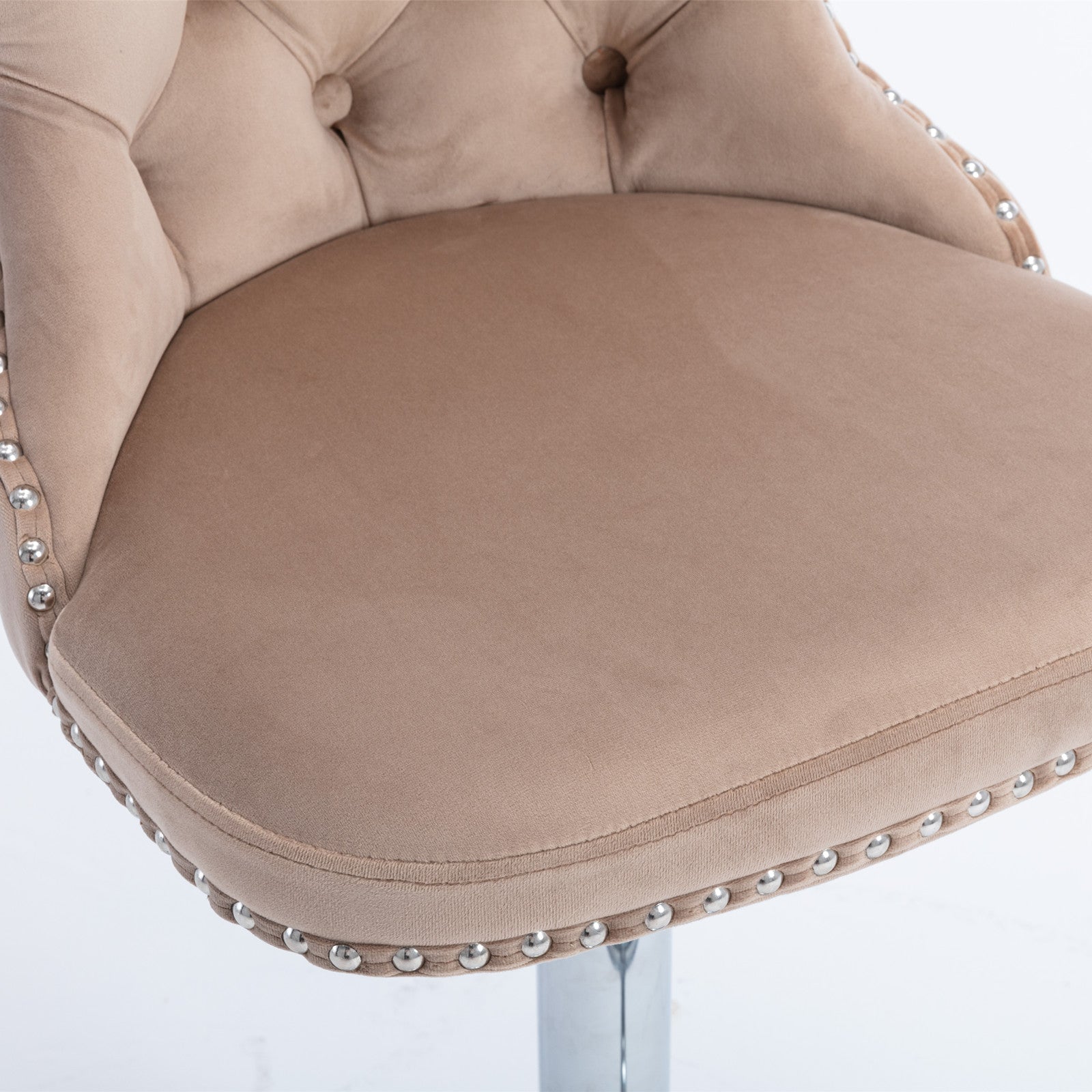 Tan velvet bar stool seat with tufted back and silver nailhead trim