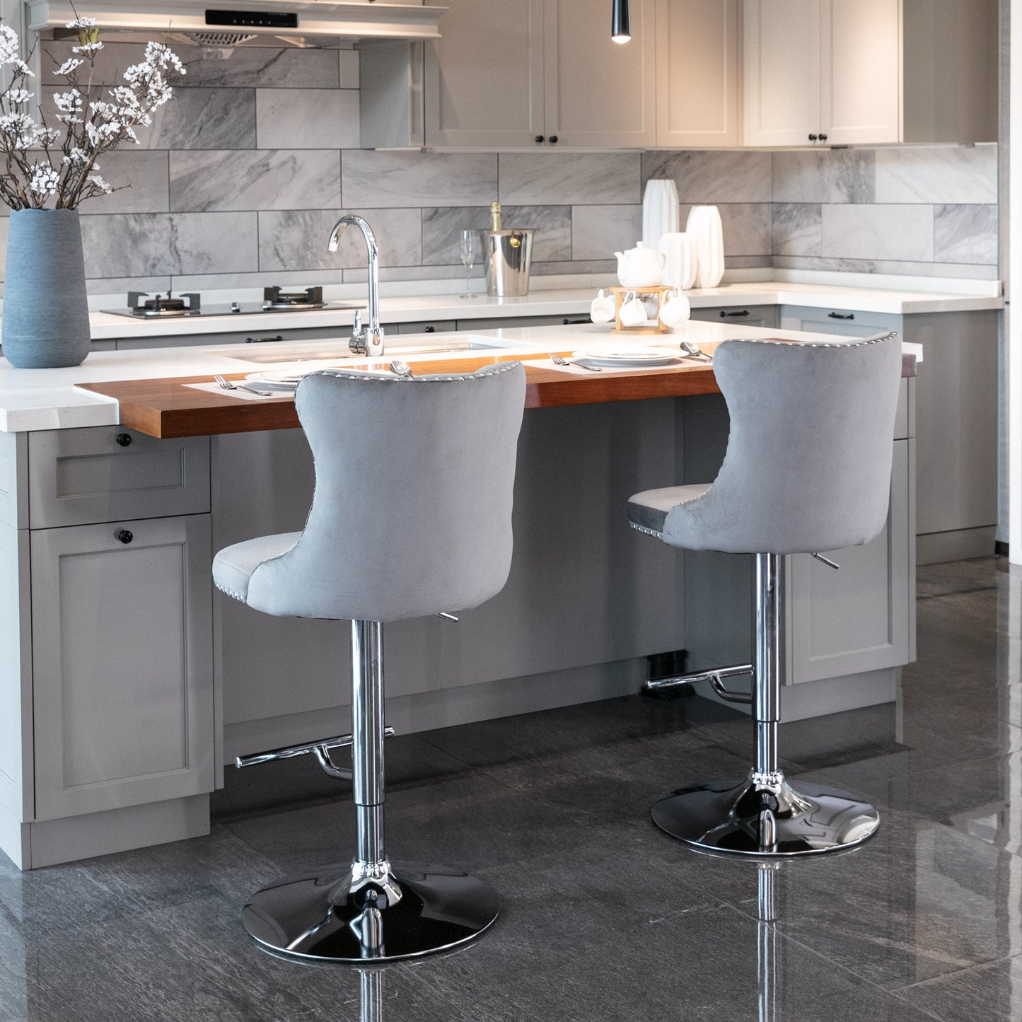 Grey velvet bar stool with chrome base and silver studding detail