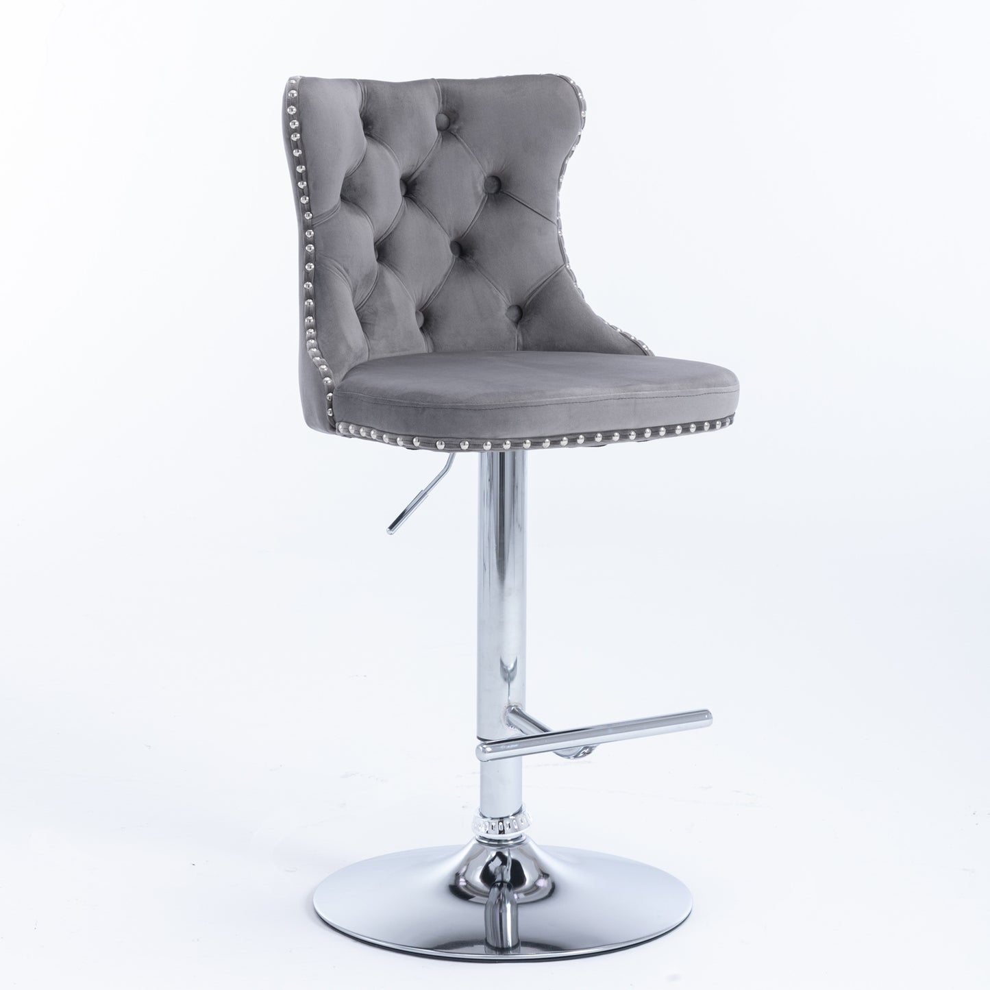Gray velvet tufted bar stool with chrome base and nailhead trim
