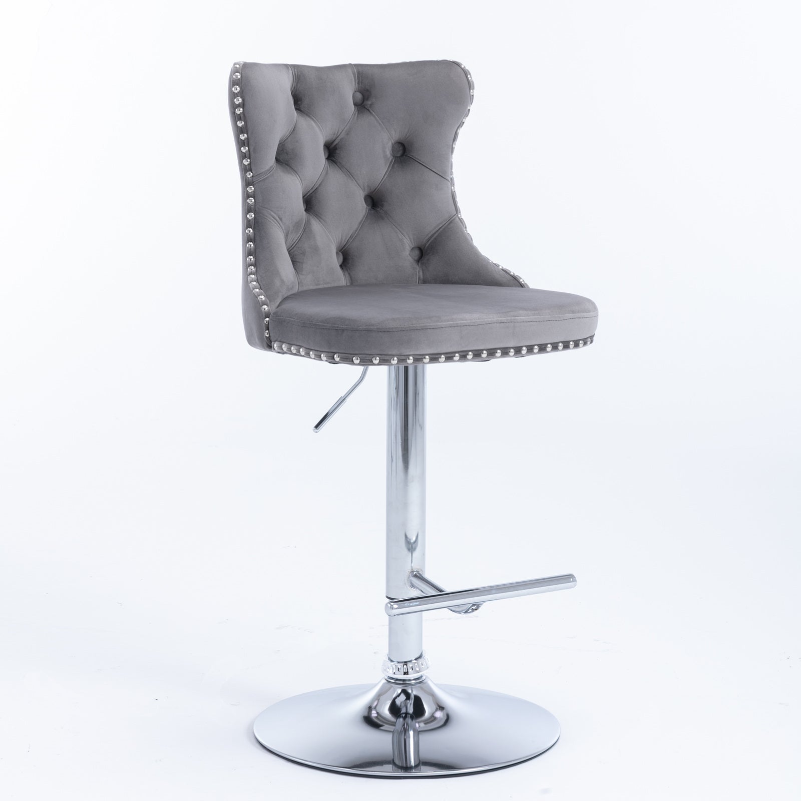 Gray velvet tufted bar stool with chrome base and nailhead trim