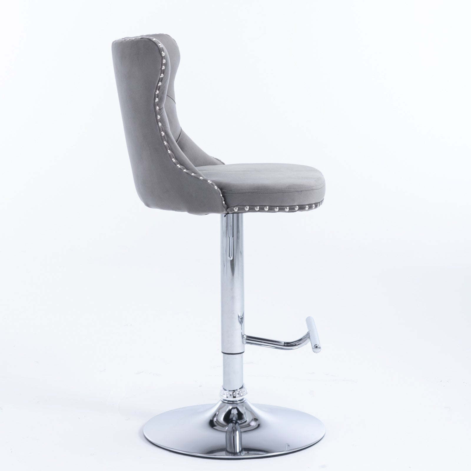 Grey velvet bar stool with silver stud trim and chrome base