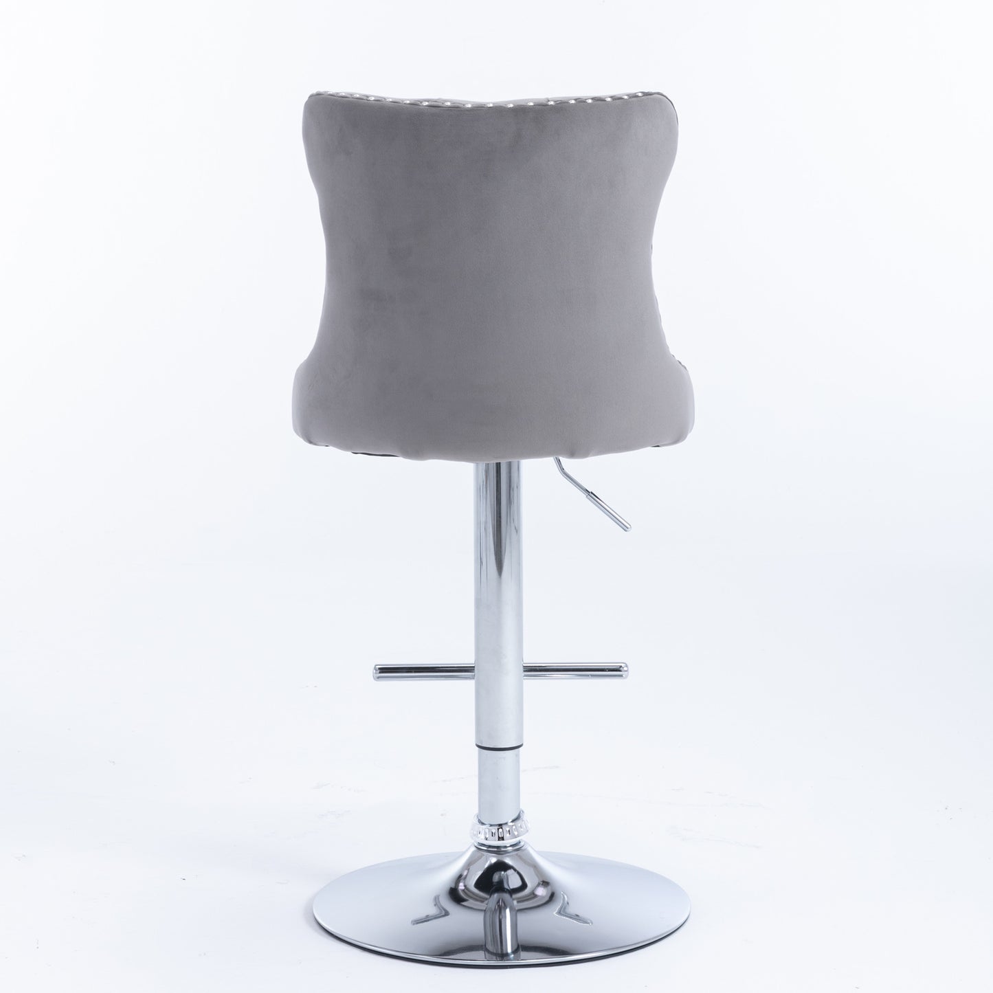 Grey velvet tufted bar stool with chrome base and adjustable height lever