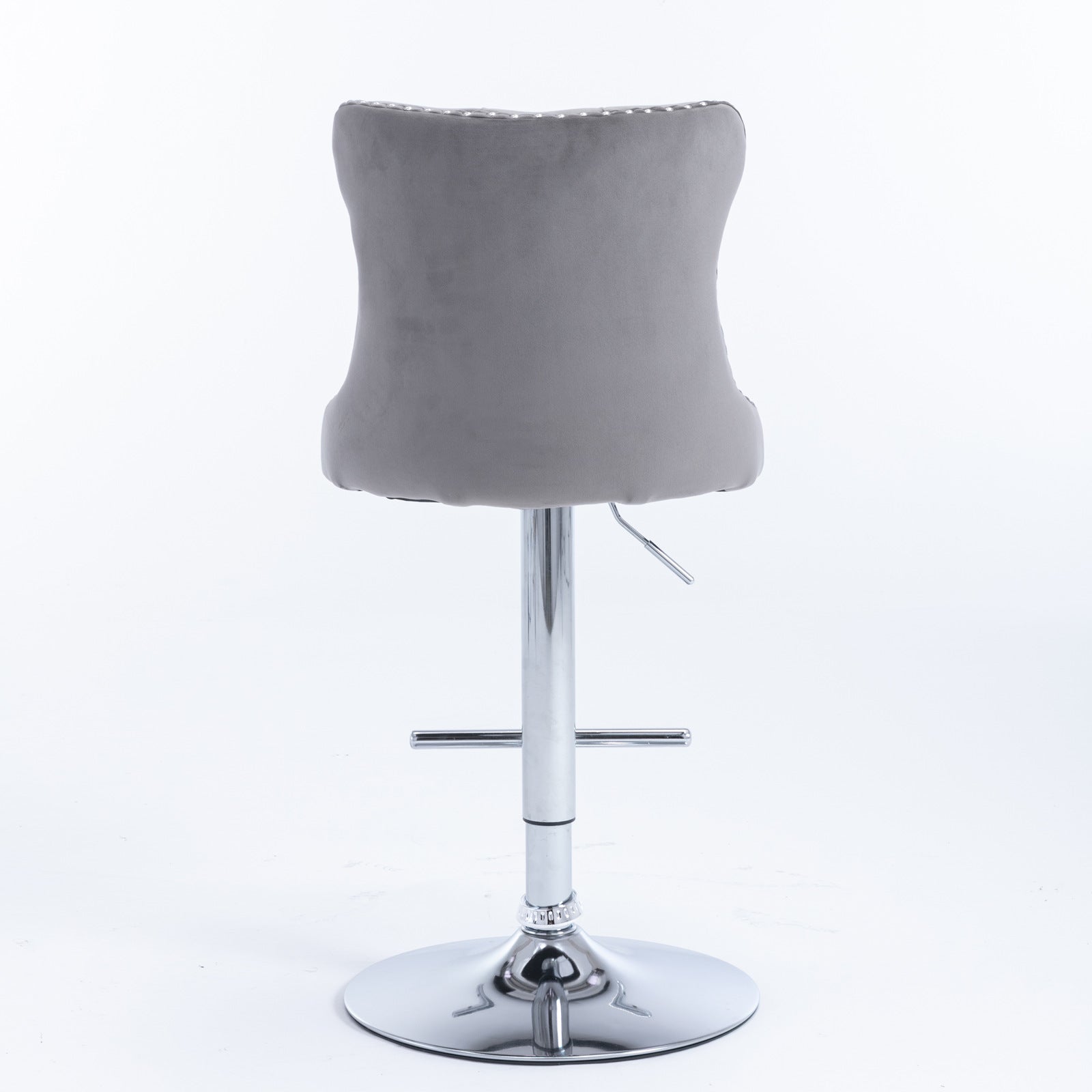 Grey velvet tufted bar stool with chrome base and adjustable height lever