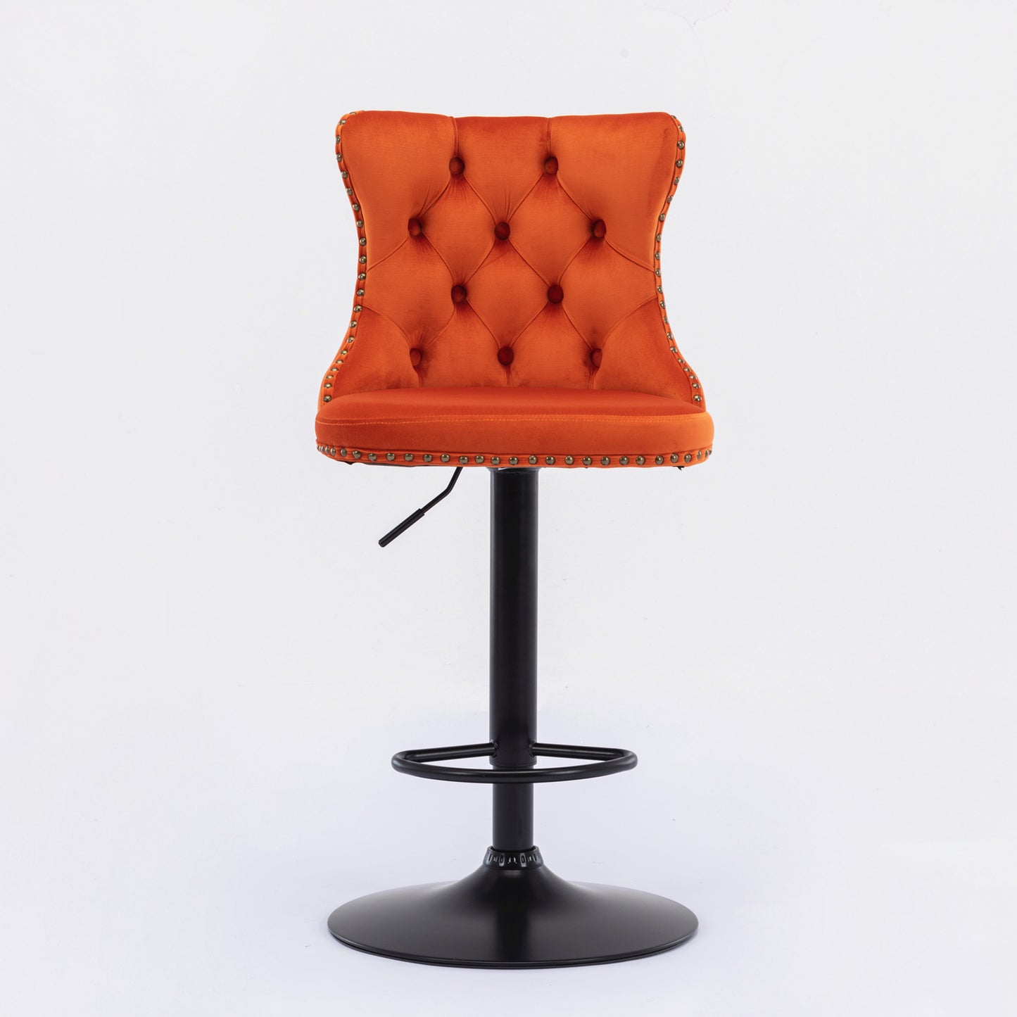 Orange velvet tufted bar stool with brass nailhead trim and adjustable height