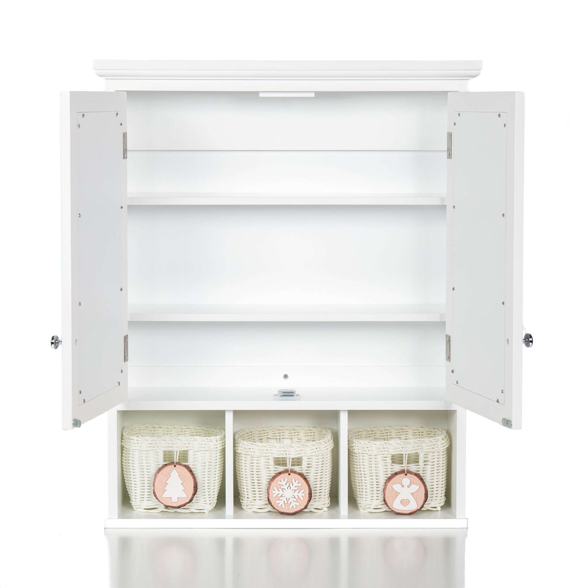 White wooden bathroom cabinet with open doors and three woven baskets below