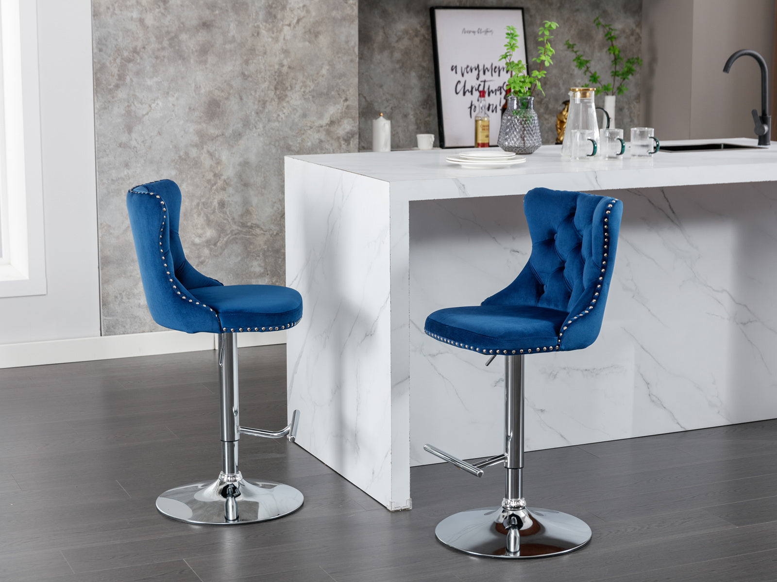Blue velvet tufted bar stool with chrome base and footrest