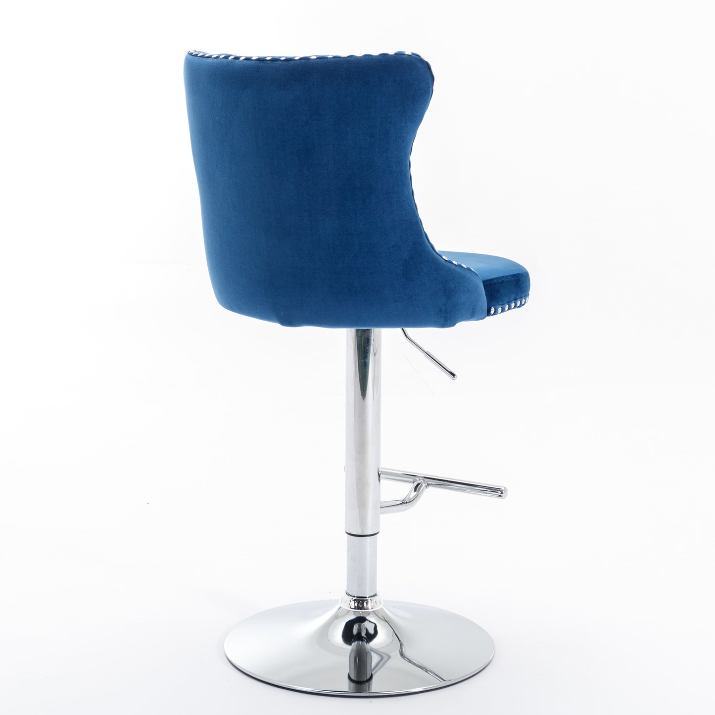Deep blue velvet bar stool with chrome base and decorative nailhead trim