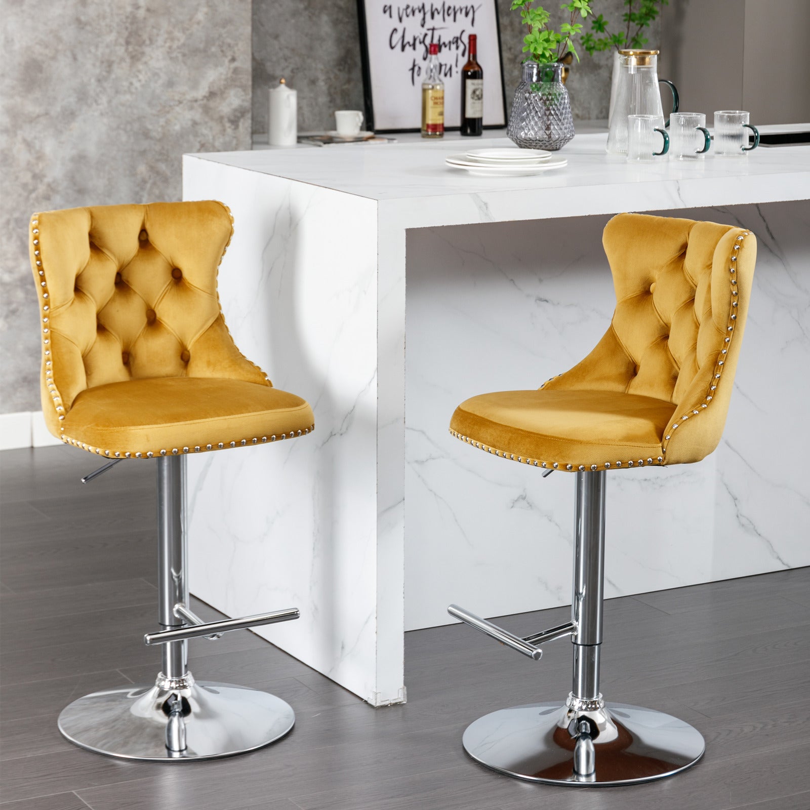 Golden velvet tufted bar stool with silver nailhead trim and chrome base