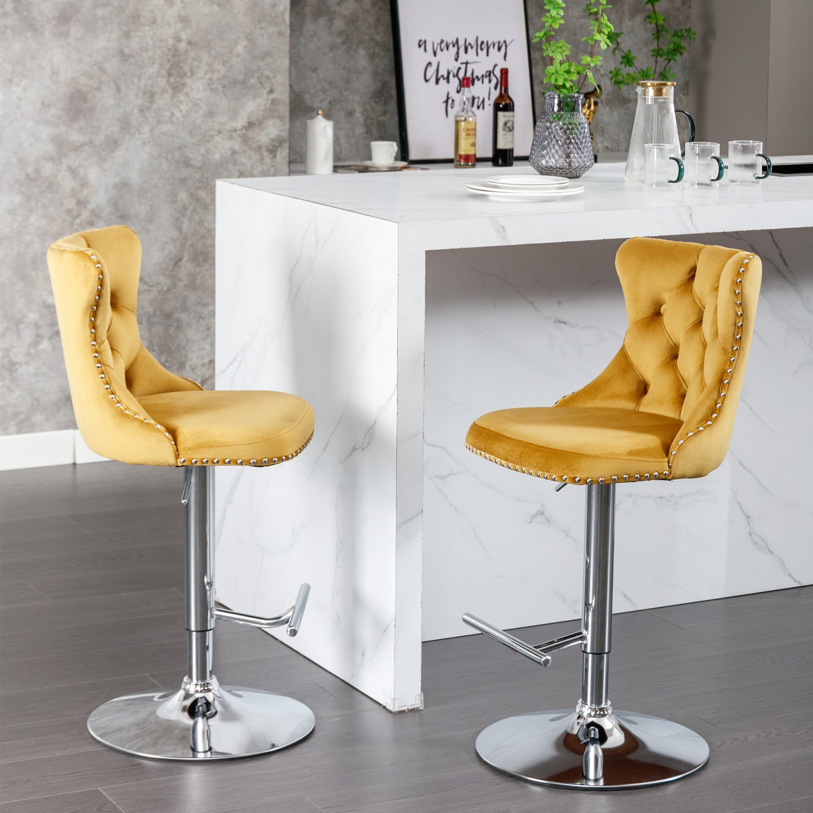 Yellow velvet tufted bar stool with silver nailhead trim and chrome base