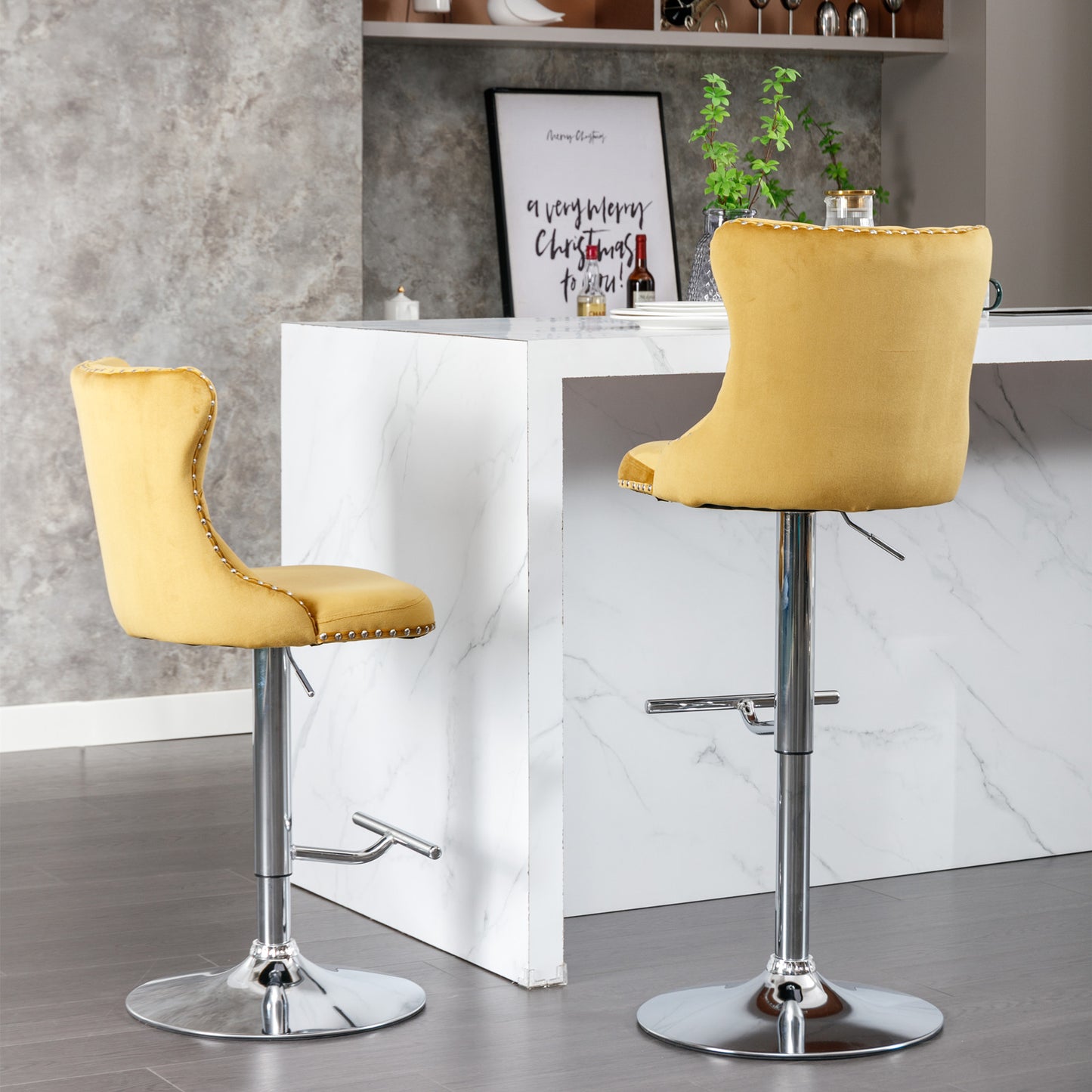 Yellow velvet bar stool with silver nailhead trim and adjustable chrome base