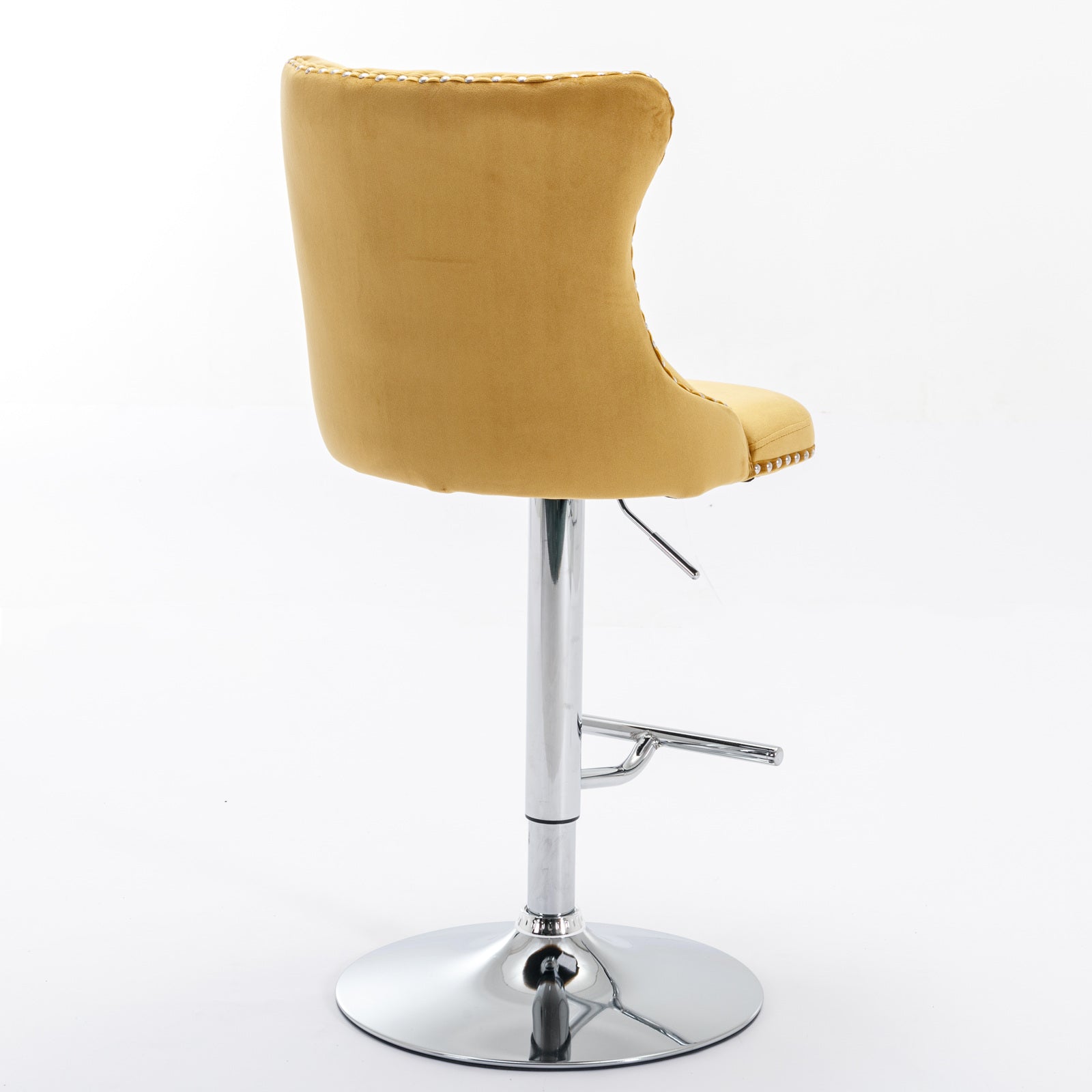 Yellow velvet tufted bar stool with silver nailhead trim and chrome base