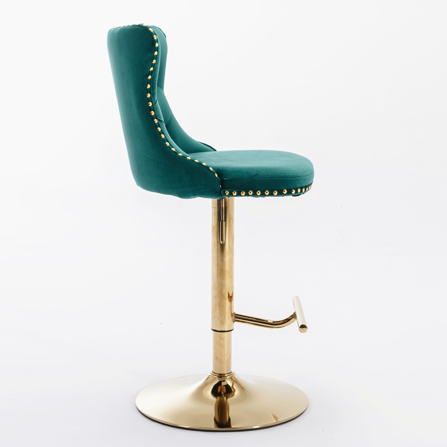 Emerald green velvet bar stool with gold nailhead trim and adjustable brass base