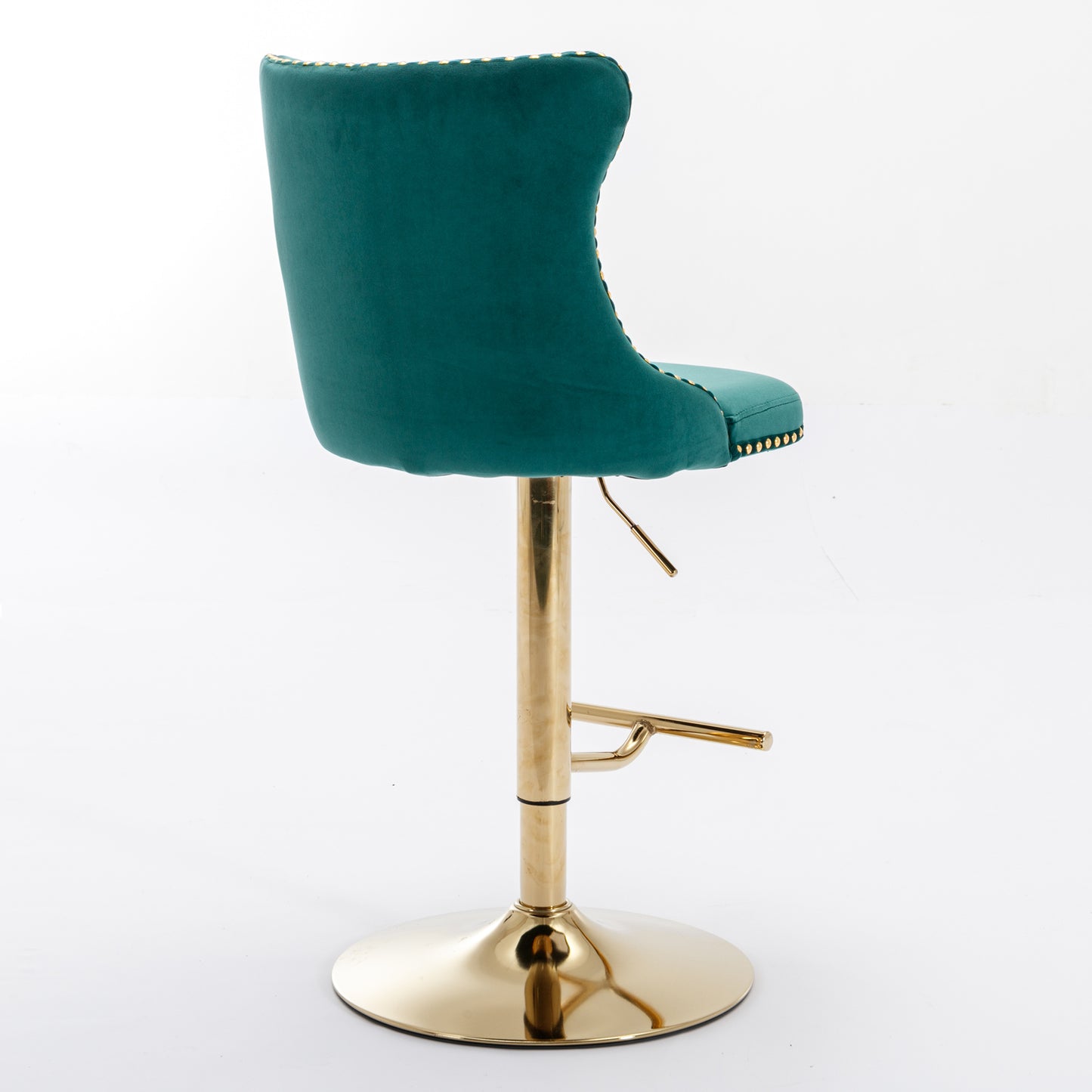 Emerald green velvet bar stool with gold base and tufted detail
