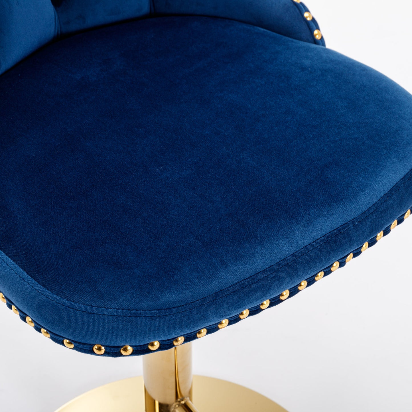 Deep blue velvet bar stool with gold stud detailing