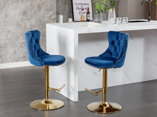 Blue velvet bar stool with gold trim and tufted back