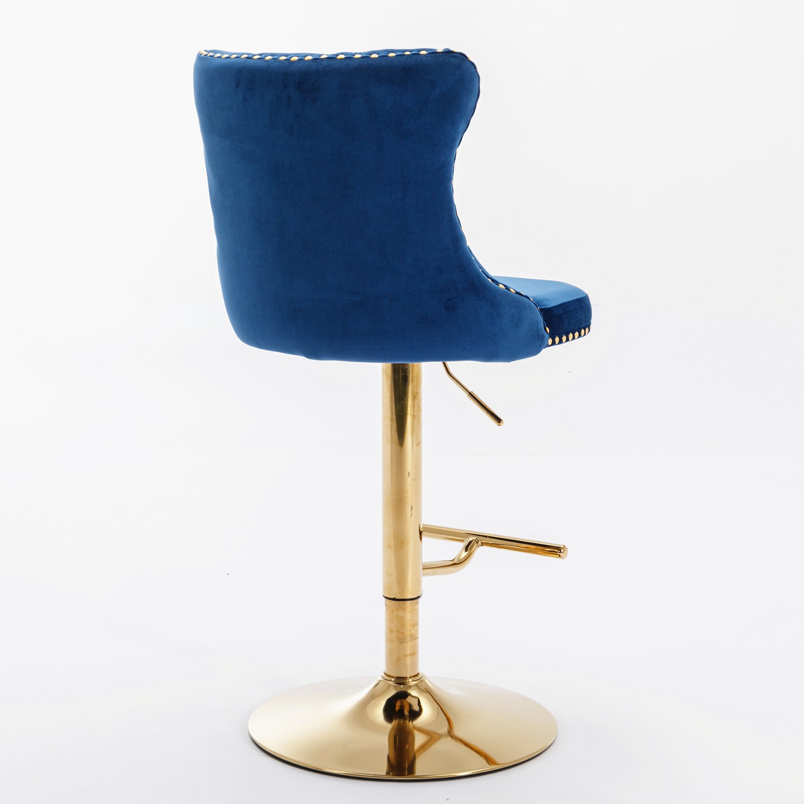 Deep blue velvet bar stool with gold accents and adjustable height