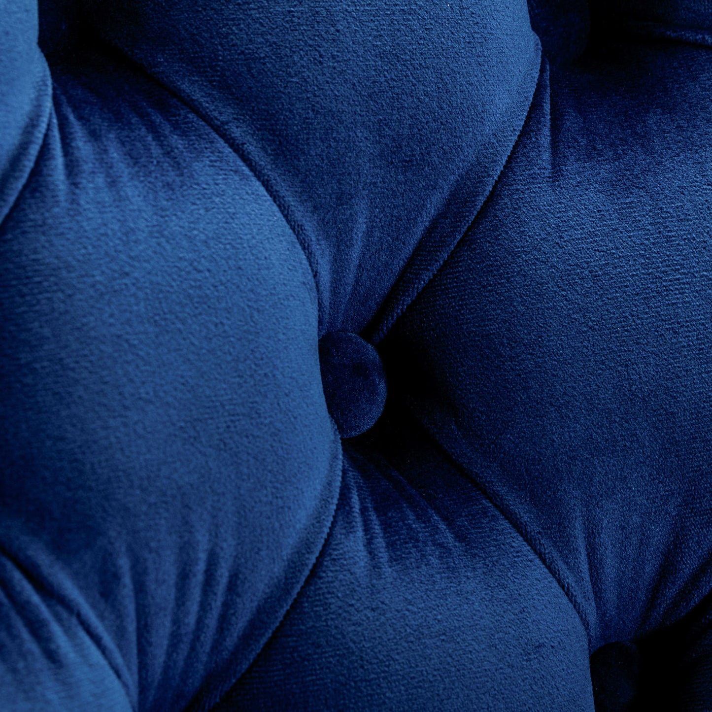 Deep blue velvet fabric with diamond tufting