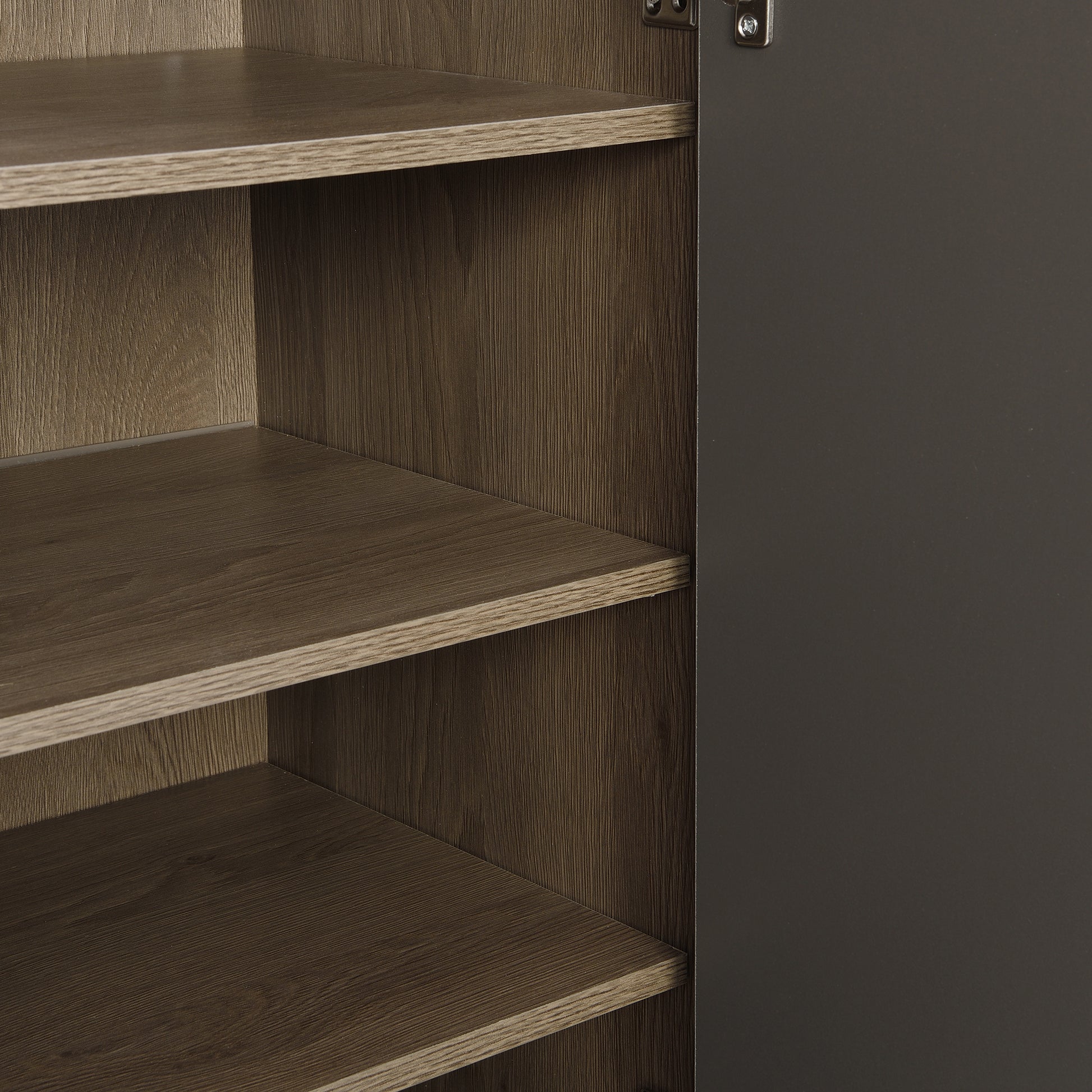 Close up of open dark brown wood grain cabinet interior with shelves