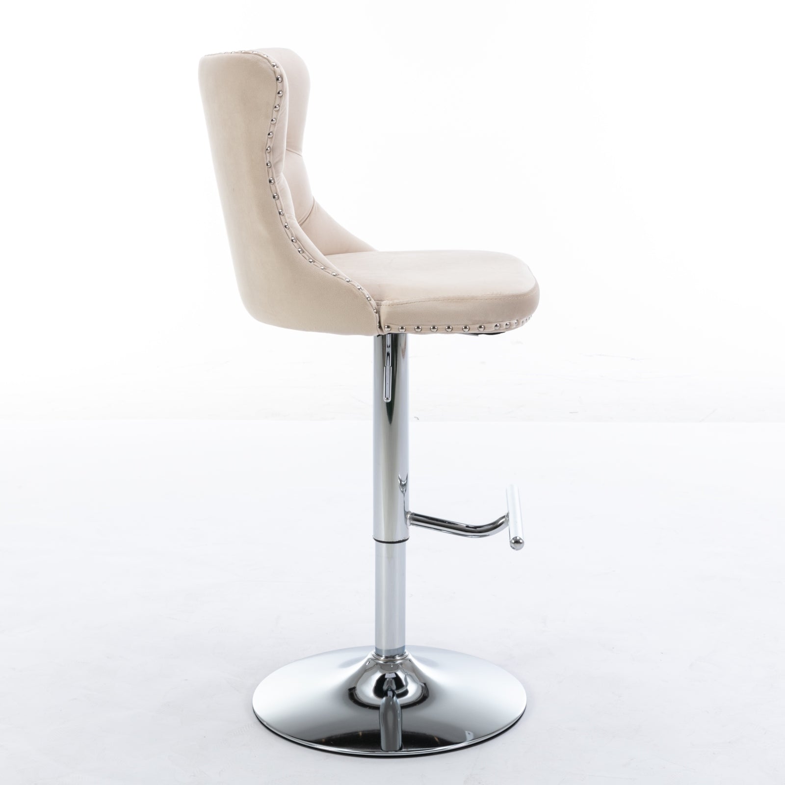 Cream velvet tufted bar stool with chrome pedestal base and footrest