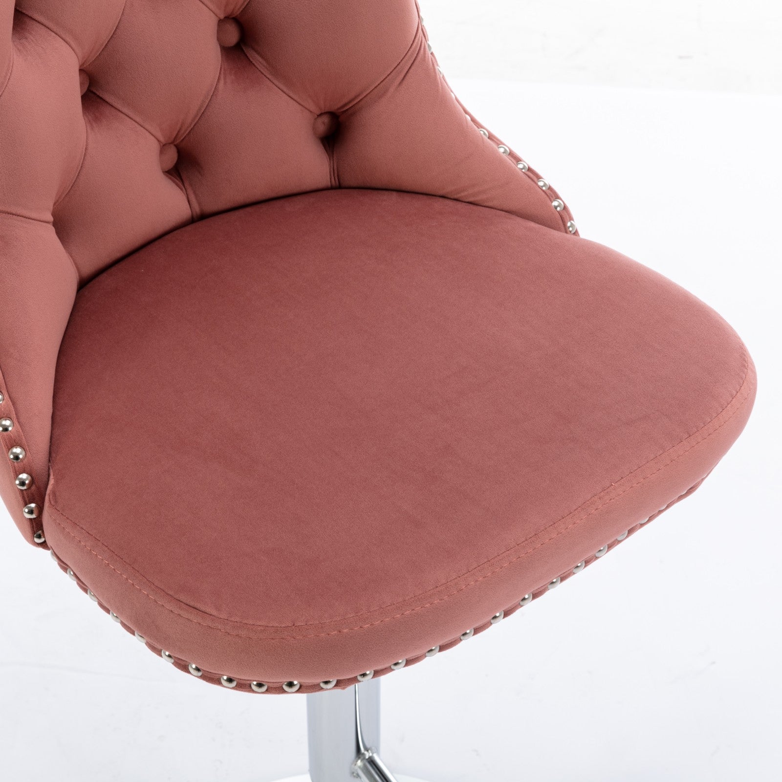 Rose velvet tufted bar stool with silver nailhead trim and chrome base