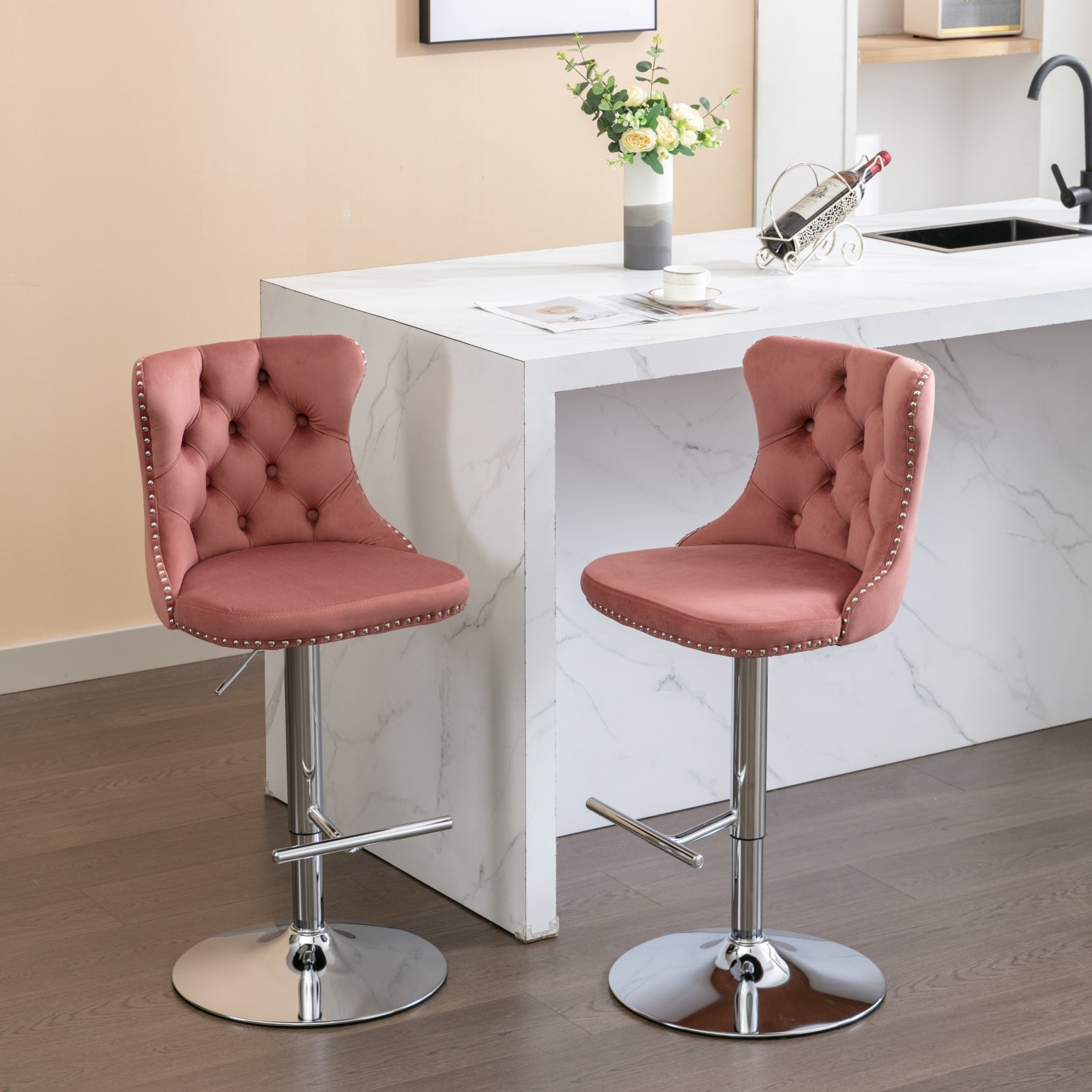Rose velvet tufted bar stool with silver nailhead trim and chrome base