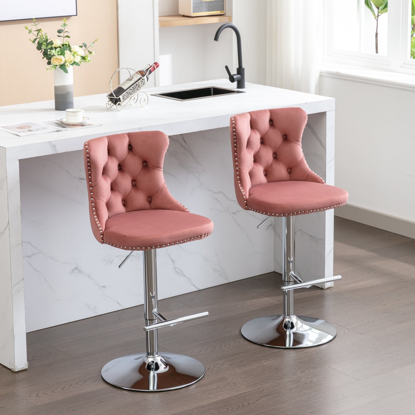 Dusty rose velvet bar stool with tufted backrest and silver nailhead trim