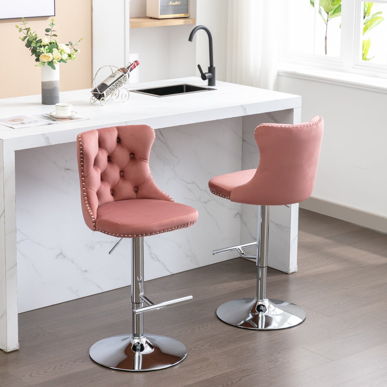 Dusty rose velvet bar stool with tufted back and silver nailhead trim