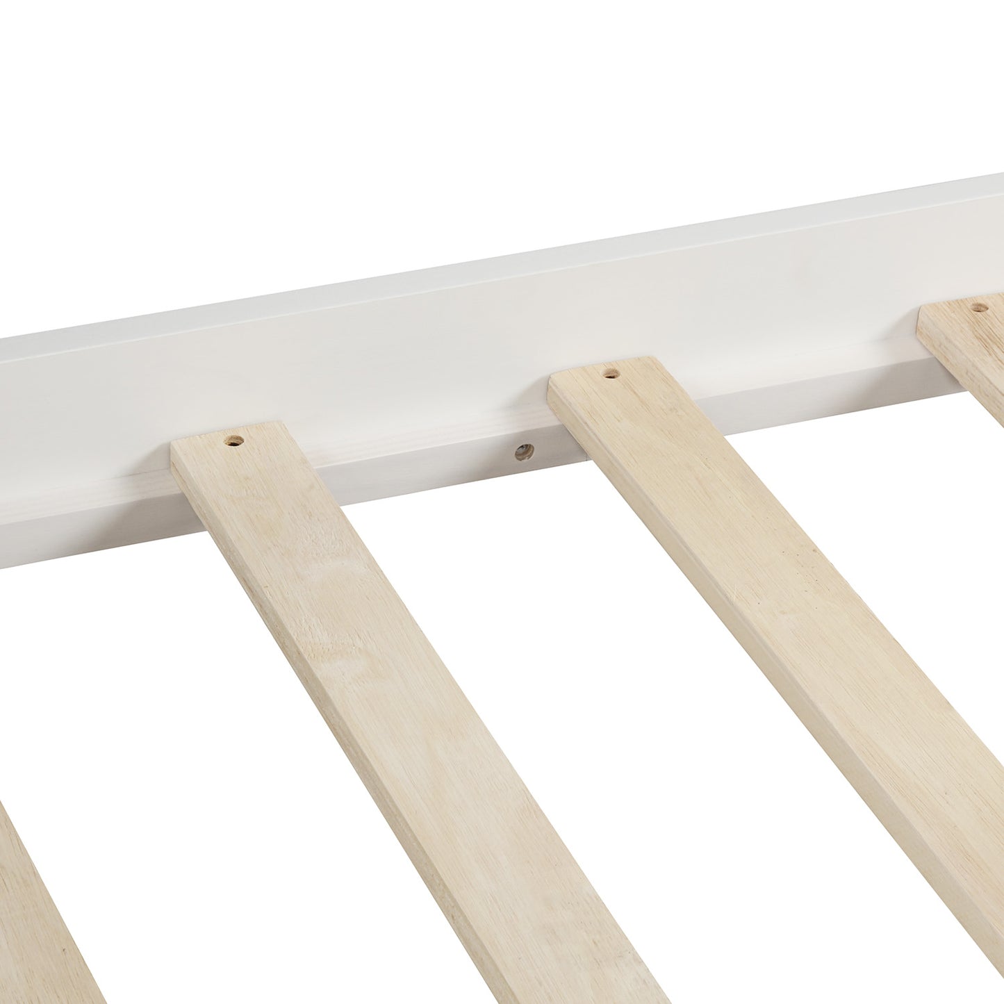 Closeup of white bed frame with natural wood slats