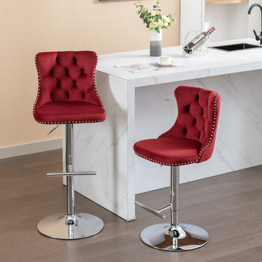 Red velvet tufted bar stool with silver nailhead trim and chrome base