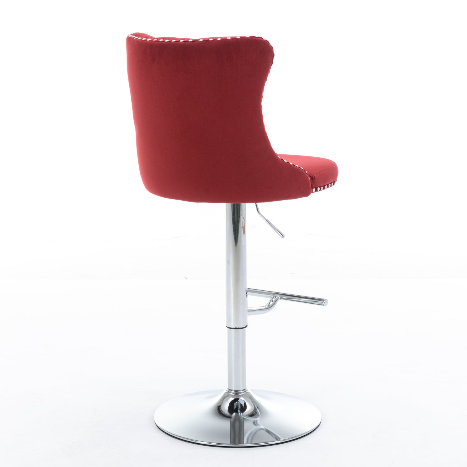 Red velvet bar stool with chrome base and decorative nailhead trim