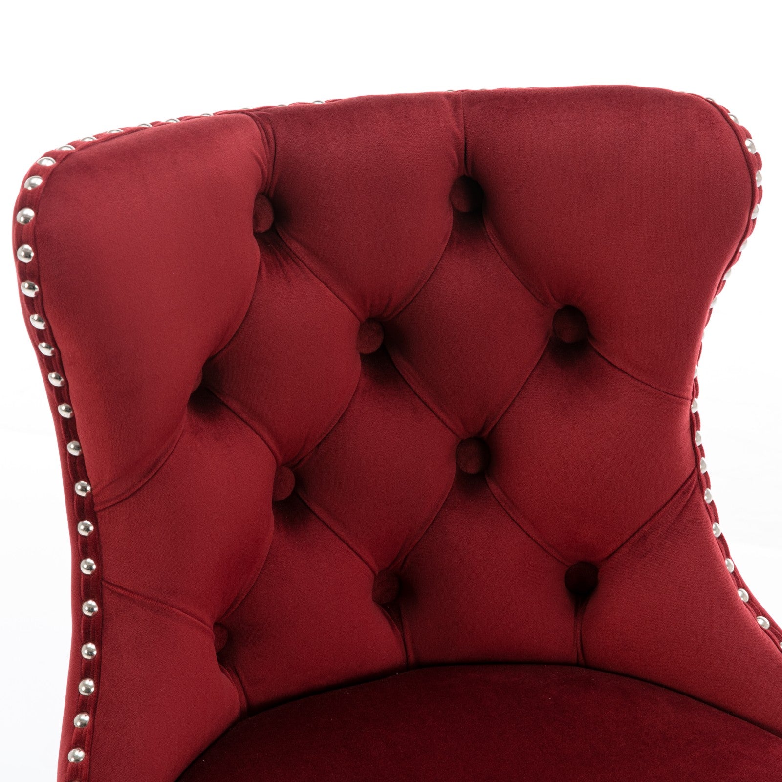 Red velvet armchair with diamond tufting and silver nailhead trim